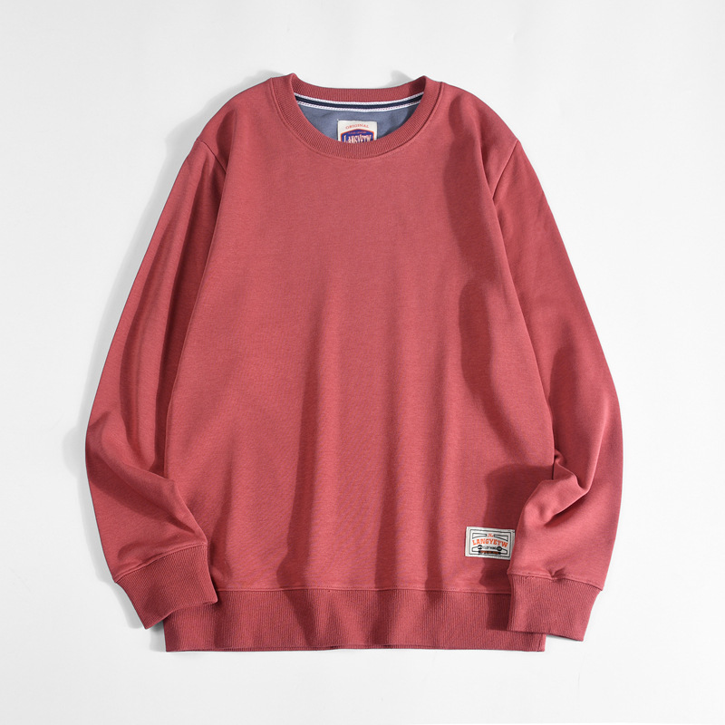 ボルドーのクルーネック長袖Tシャツ、袖口ロゴパッチ付き