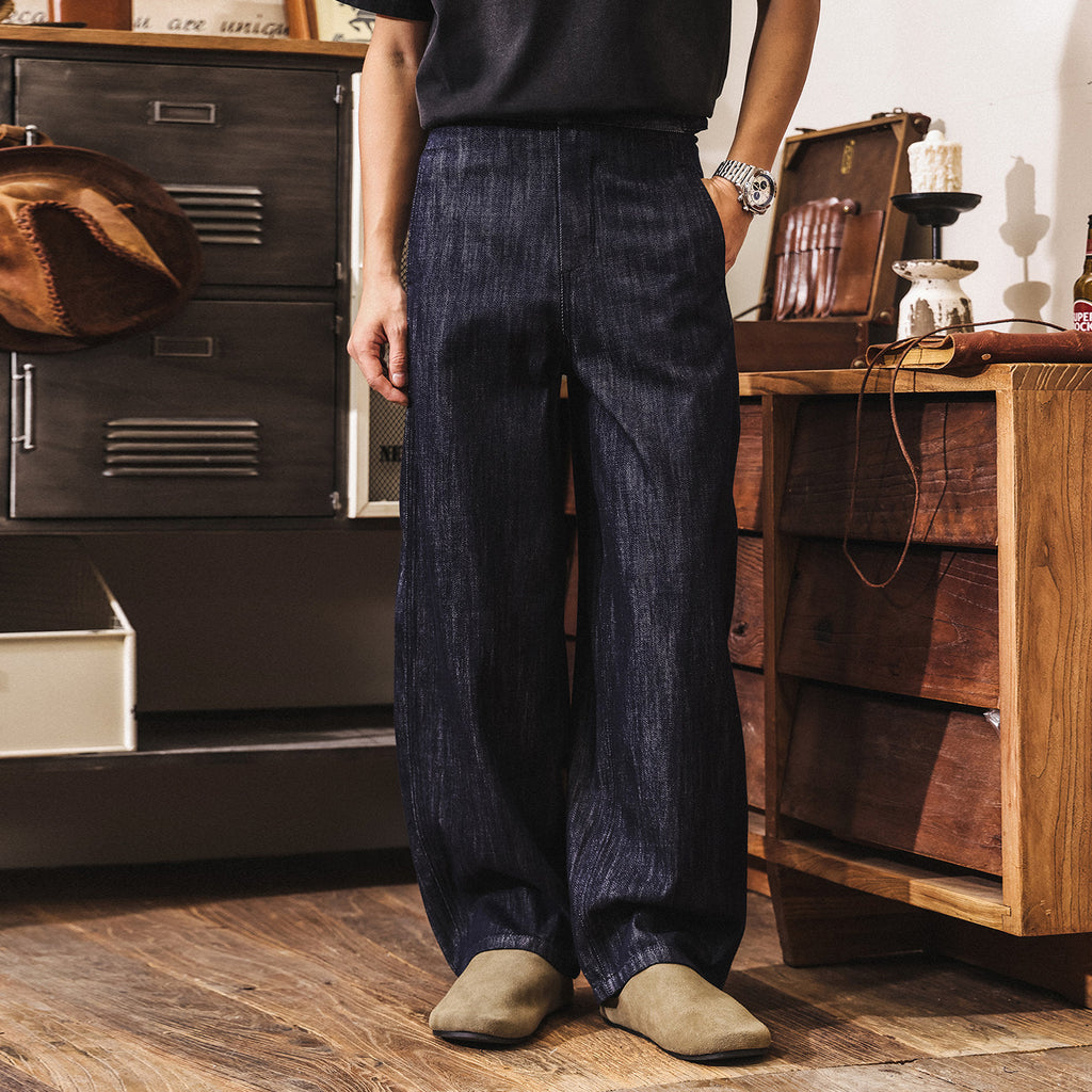 ダークブルーのワイドレッグデニムパンツ、ロング丈でゆとりのあるメンズ用