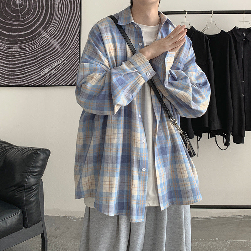 青系チェック柄の長袖シャツ、胸ポケットとゆったりシルエット