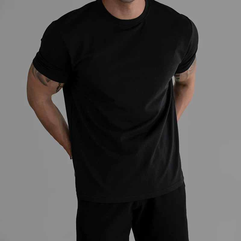 メンズの黒いクルーネック半袖Tシャツ、スリムフィット無地