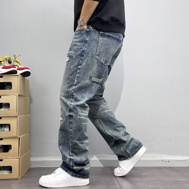 メンズ テーパードデニムパンツ、サイドにダメージ補修パッチ